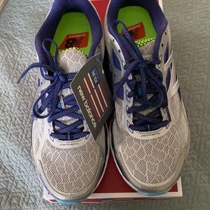 New in box. NewBalance 880v5. Silver with navy and teal.